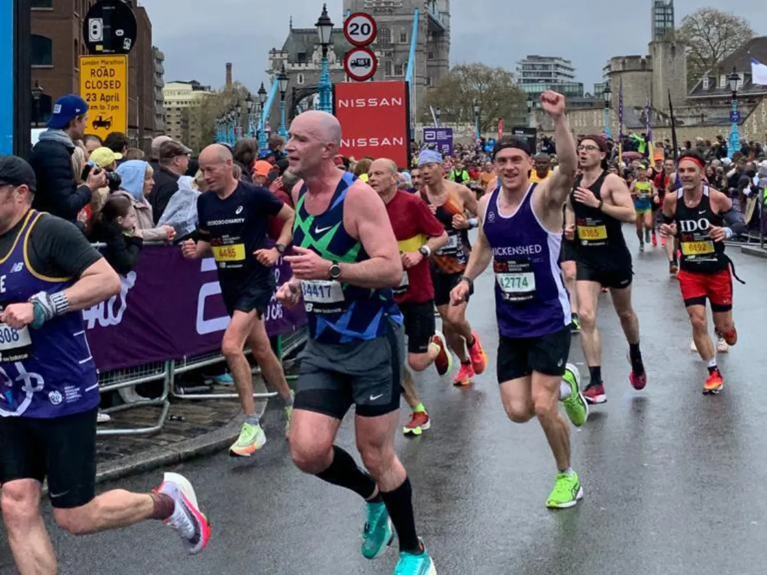 person runs for chickenshed at 2023 london marathon