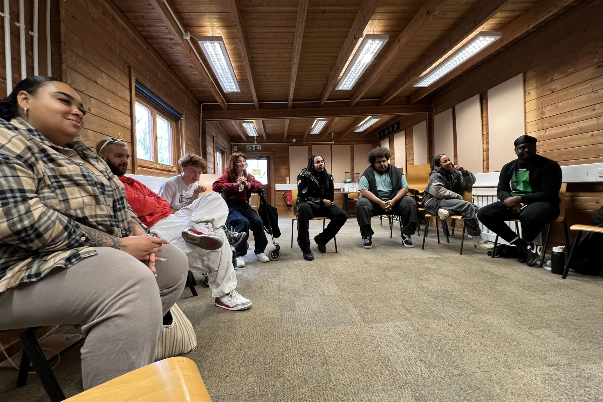 a workshop session where people are sat in a semi-circle