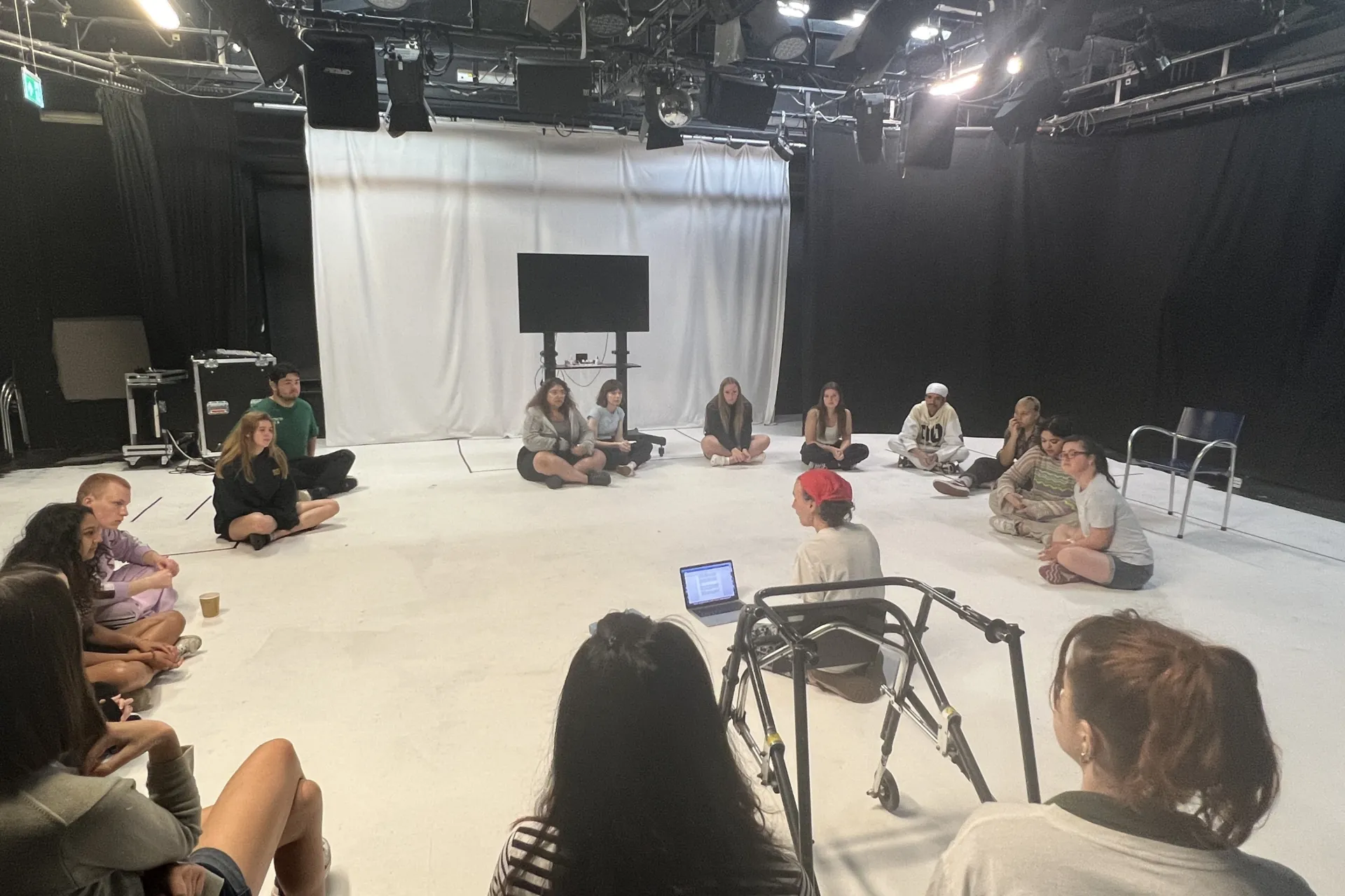workshop with people sitting in a circle