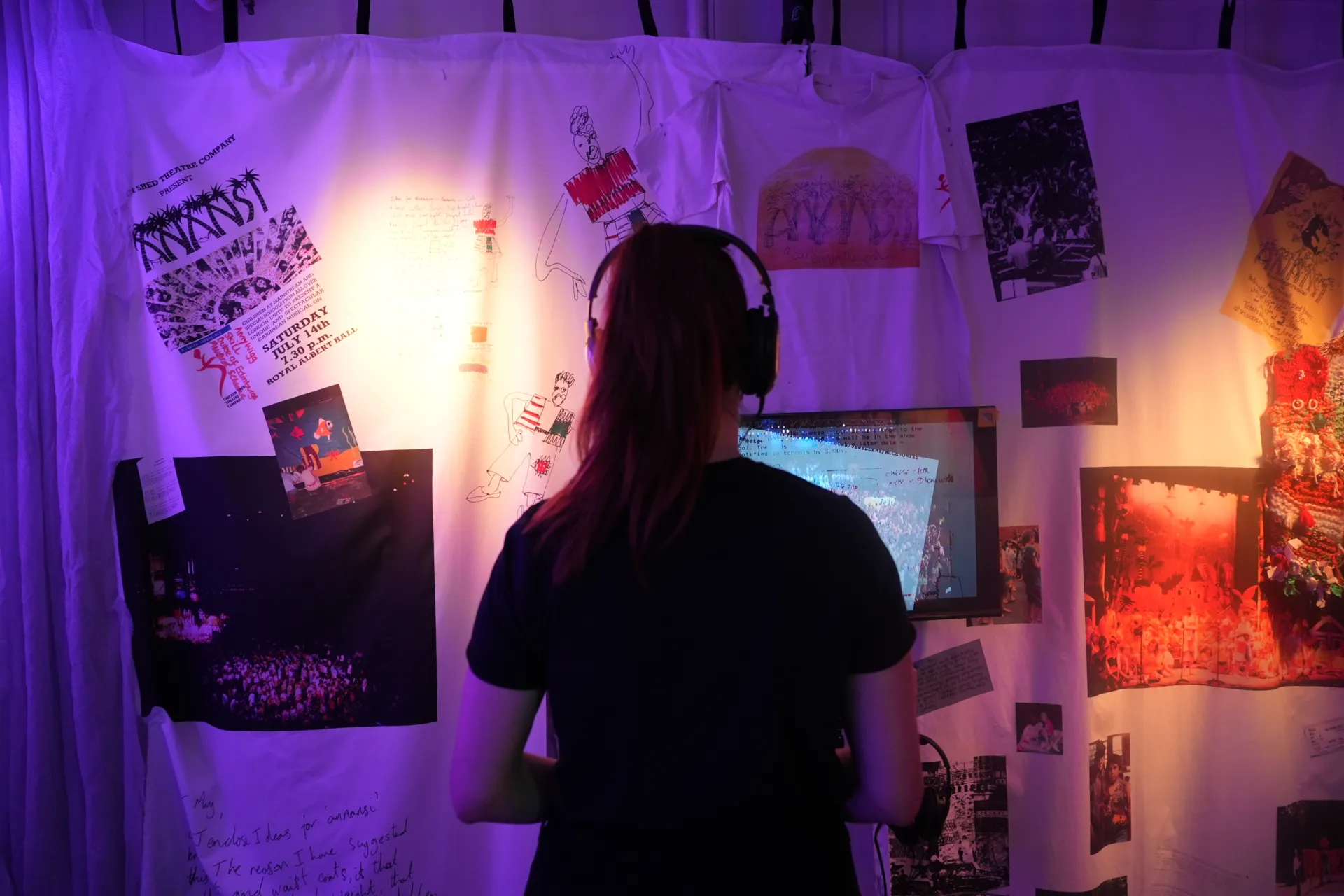 Staff member looking at our Anansi films