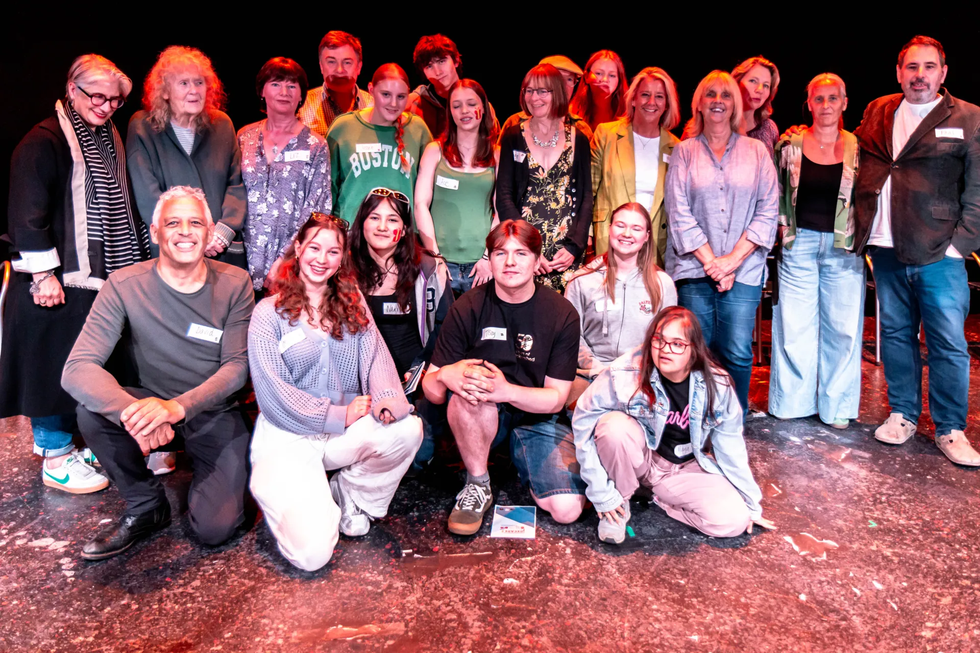 living letters group of 20+ on stage