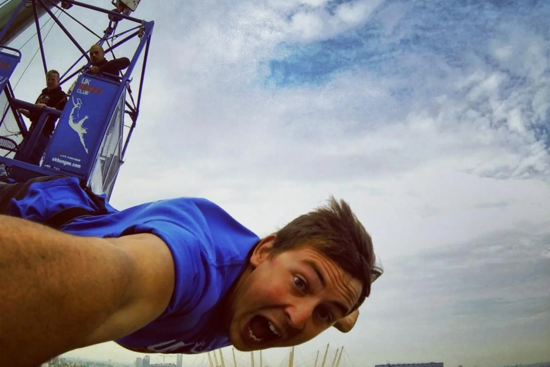 a boy films himself doing a bungee jump