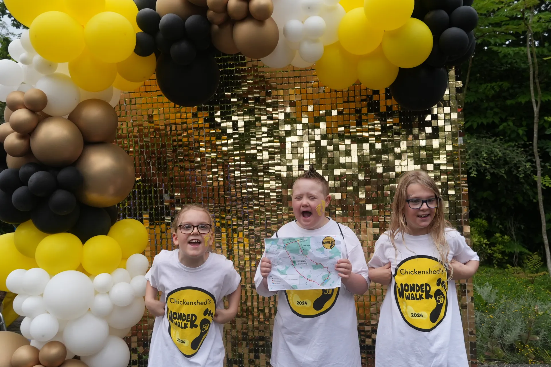 3 children celebrating after completing the Wonder Walk
